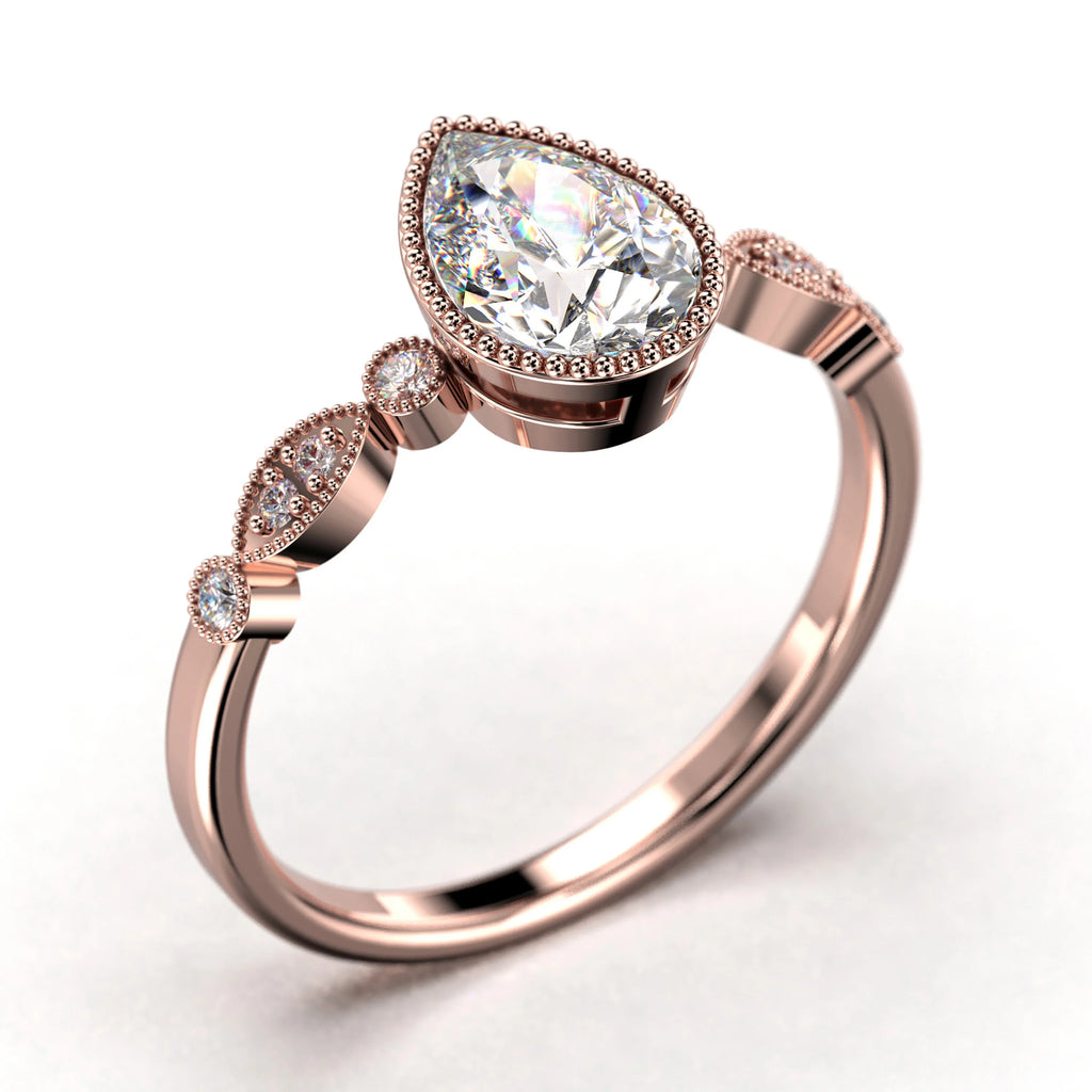 1.25 Carat Pear Cut Moissanite Engagement Ring in 925 Sterling Silver With 18k Rose Gold Plating R46940